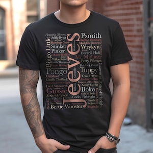 May include: A black t-shirt with a pink and white word cloud design featuring names and characters from the Jeeves and Wooster series by P.G. Wodehouse. The word cloud includes names like Bertie Wooster, Jeeves, Psmith, Tuppy, and others.