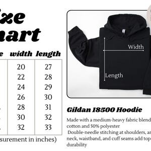 May include: Black Gildan 18500 hoodie with a size chart showing measurements in inches. The chart lists sizes S to 4XL, with widths from 20 to 32 inches and lengths from 27 to 33 inches. The hoodie has a hood and is made of a cotton and polyester blend.