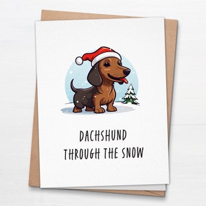 Teckel dans la neige - carte de Noël pliée - jolie carte de teckel - carte de voeux drôle de chien de vacances