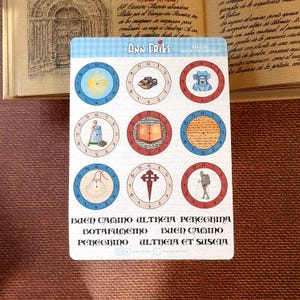 STICKERS de RELOJES del CAMINO de Santiago. 1 hojas de 16 pegatinas (9 relojes + 7 expresiones típicas del Camino).