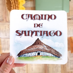 PORTADAS CAMINO de SANTIAGO. Colección de 7 pegatinas grandes. Letras medievales. Palloza de O Cebreiro. Flecha amarilla.