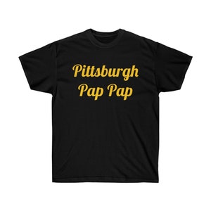 May include: Black t-shirt with the text "Pittsburgh Pap Pap" in gold lettering.
