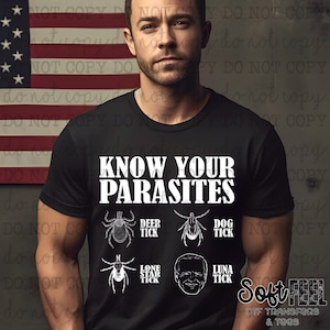May include: A black t-shirt with the text "Know Your Parasites" and illustrations of different types of ticks, including a deer tick, dog tick, lone star tick, and a tick labeled "Luna Tick" that is a caricature of a person's face.
