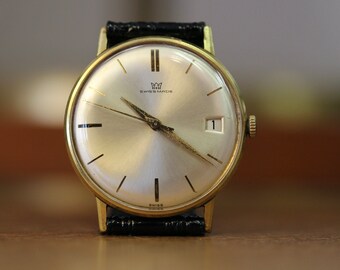 Vintage Zwitserse makelij dresswatch heren 34 mm H+H FHF72 handopgewonden mechanisch horloge verguld jaren 1960