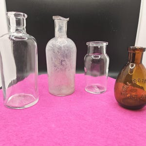 Vintage Round Cork Top Bottles: Group of 4