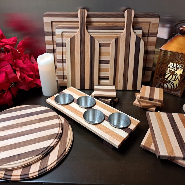 AWP makes quality edge grain cutting boards, cheese boards, coasters and serving platters by combining cherry, maple and walnut hardwoods.