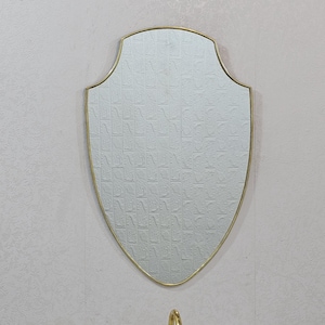 Italian Brass Shield Mirror: Asymmetrical Wall Decor