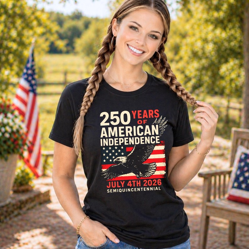 Woman wearing black America 250 patriotic tshirt with eagle and American flag design celebrating 250 years of American independence July 4th 2026 semiquincentennial patriotic apparel for women summer 4th of July outfit.