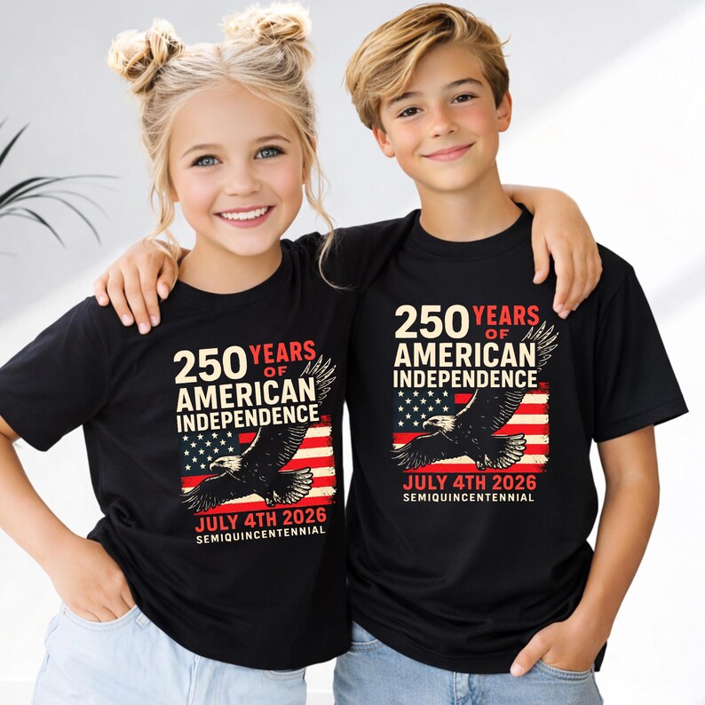 Youth boy and girl wearing matching 250 Years of American Independence patriotic shirts smiling together