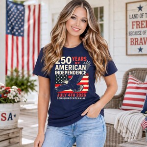 Woman wearing Navy Blue America 250 patriotic tshirt with eagle and American flag design celebrating 250 years of American independence July 4th 2026 semiquincentennial patriotic apparel for women summer 4th of July outfit.