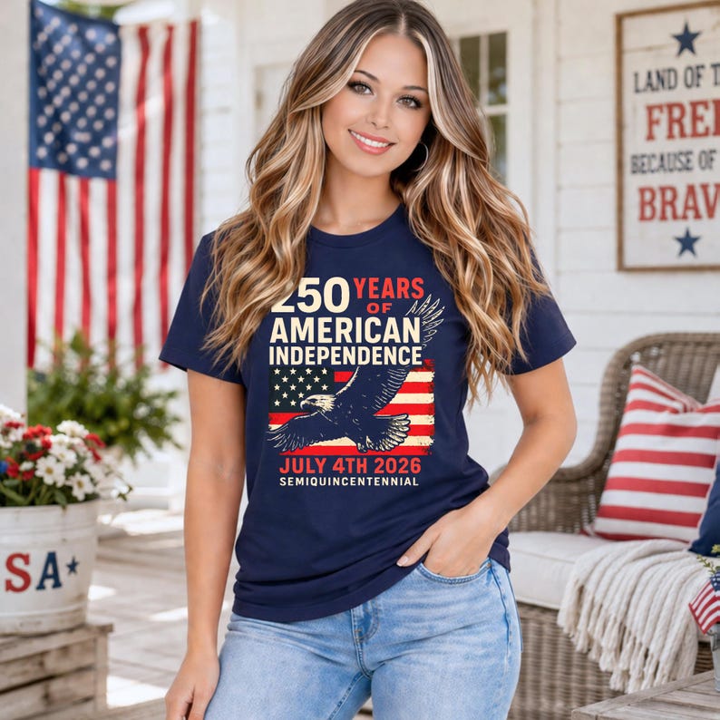 Woman wearing Navy Blue America 250 patriotic tshirt with eagle and American flag design celebrating 250 years of American independence July 4th 2026 semiquincentennial patriotic apparel for women summer 4th of July outfit.