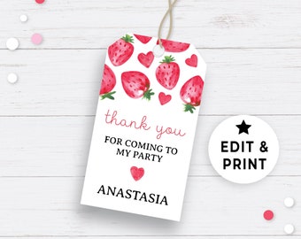 May include: White thank you tag with a red strawberry pattern and the text "thank you for coming to my party Anastasia".