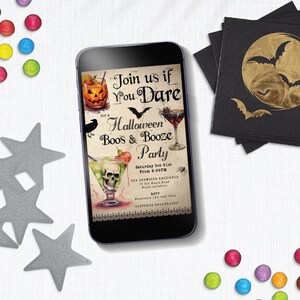 May include: A Halloween party invitation displayed on a smartphone screen. The invitation features a skull and crossbones in a martini glass, a pumpkin, and bats. The text reads "Join us if you dare for a Halloween Boos & Booze Party".