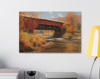 Op de afbeelding: Een schilderij van een rode overdekte brug over een rivier, met herfstbladeren aan de bomen. De rivier stroomt door een vallei, met rotsen en bomen langs de oevers.