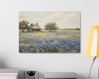 May include: A painting of a rustic wooden cabin in a field of bluebonnet wildflowers. The cabin has a porch and a wooden roof. The field is filled with bluebonnets, a type of wildflower native to Texas.