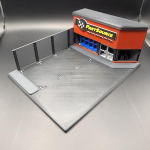 1:64 Scale Diecast Car Performance / Partsource Shop with Parking Lot - Perfect for Displaying Your Collection!