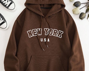 Sudadera con capucha marrón 'New York USA' - Comodidad urbana en cada puntada