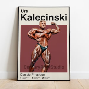 May include: A vintage-style poster featuring a bodybuilder, Urs Kalecinski, in a classic physique pose. The poster has a red background and black text, including the title "Classic Physique" and the text "Century Print Studio".