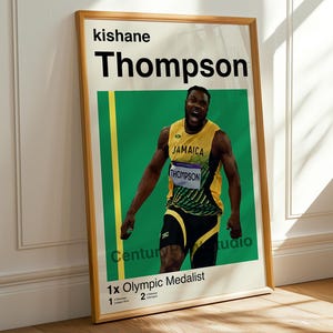 May include: Framed poster featuring Kishane Thompson, a Jamaican Olympic medalist, in a yellow and black athletic uniform. The poster includes the text "Kishane Thompson" in large black letters, with additional text at the bottom.