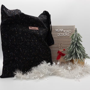 Baumwolltasche schwarz mit kleinen Engelchen und Sternen