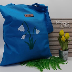 Baumwolltasche blau mit Schneeglöckchen Motiv
