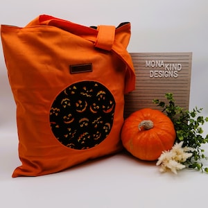 Baumwolltasche orange mit Kürbisgesichtern