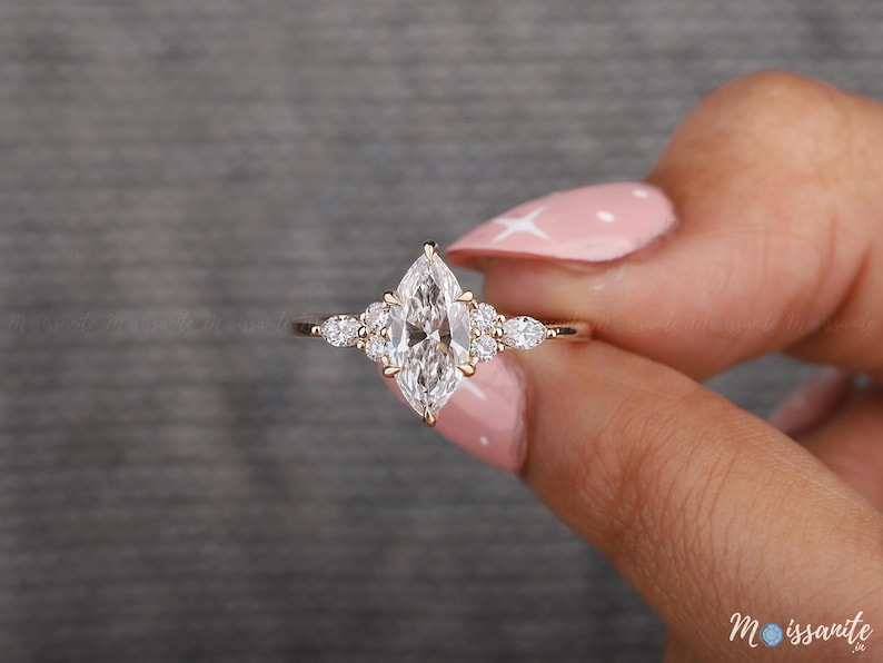 engagement ring
Vintage Marquise Cut Moissanite Engagement Ring Women's Diamond Wedding Ring with Side Stone Delicate 14k Solid Gold Diamond Promise Ring
14k gold ring
anniversary ring
christmas
cluster ring
diamond ring
engagement ring
marquise ring
personalized ring
promise ring
statement ring
unique wedding ring
wedding ring for women
Marquise Cut Cluster Engagement Ring Moissanite Diamond Wedding Ring 14K Solid Gold Anniversary Ring Marquise Promise Ring Gift Ring.
side three round ring