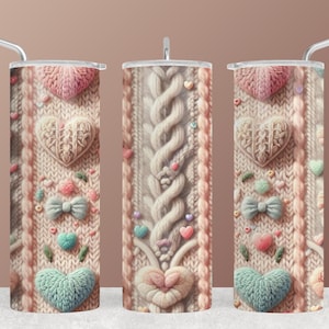 May include: A set of three insulated tumblers with a knitted design featuring hearts, bows, and cable knit patterns in shades of pink, cream, and teal. Each tumbler includes a silver straw and lid.
