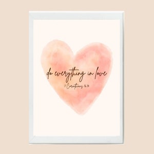 May include: A watercolor painting of a pink heart with the text "do everything in love" and "1 Corinthians 16:14" written below the heart.