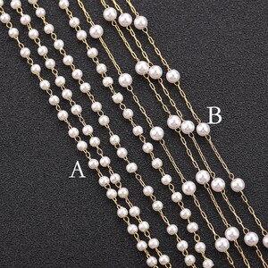 May include: Six strands of gold chain necklaces with white pearl beads. The necklaces are arranged in a fan shape, with the top strand being the shortest and the bottom strand being the longest. The necklaces are labelled "A" and "B".