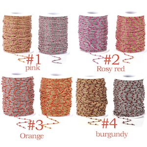 May include: Four spools of chain with different colored beads. The chain is silver with small colored beads. The colors are pink, rosy red, orange, and burgundy. The spools are labeled #1 pink, #2 Rosy red, #3 Orange, and #4 burgundy.