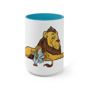 Dorothy, Toto, and the Cowardly Lion by W. W. Denslow Two-Tone Coffee Mugs, 15oz