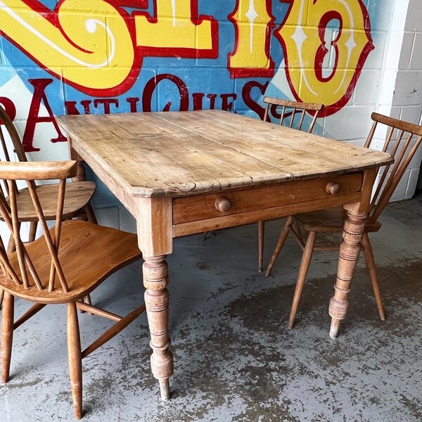 Antique 19thc scrubbed pine farmhouse table with a draw.