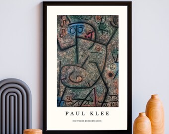 May include: A black framed print of an abstract painting by Paul Klee titled "Oh! These Rumors" (1929). The painting features a stylized human figure with a blue and red face, surrounded by abstract shapes and lines in shades of brown, green, and yellow.