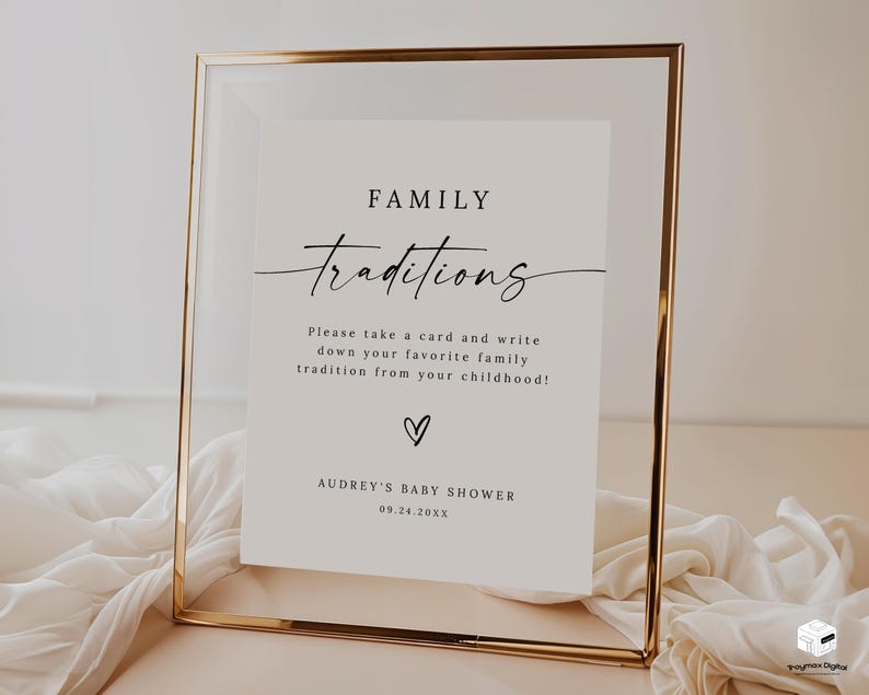 May include: A white sign with a gold frame, with the text "FAMILY Traditions" in black script. The sign instructs guests to write down their favorite family tradition from their childhood. The sign also includes the text "AUDREY'S BABY SHOWER 09.24.20XX".