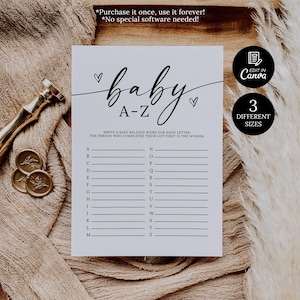 May include: A white baby shower game card with the text "baby A-Z" in a script font. The card includes lines for writing baby-related words for each letter of the alphabet. A gold wax stamp and seals are on the left. The card is available in 3 sizes.