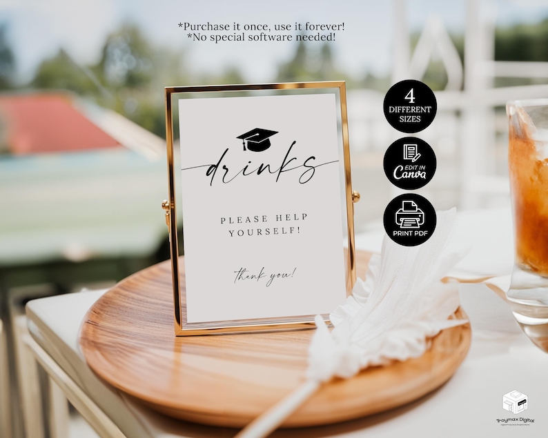 May include: A framed sign with the word "drinks" in elegant script, topped with a graduation cap illustration. The sign reads "Please help yourself!" and "thank you!" in a gold frame, on a wooden tray.
