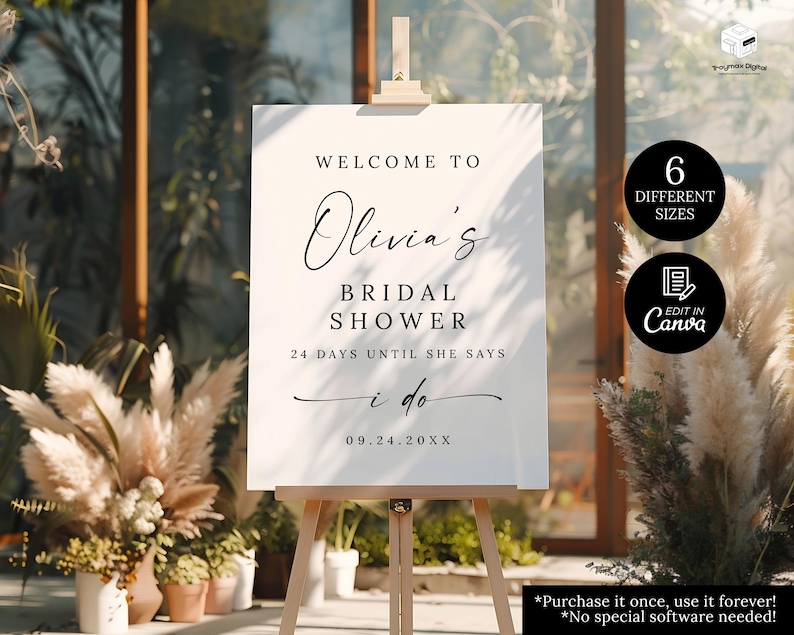 May include: A white sign on a wooden easel with the text "Welcome to Olivia's Bridal Shower." The sign also includes the text "24 days until she says I do" and the date "09.24.20XX."