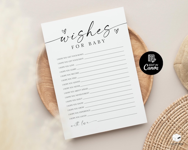 K&ouml;nnte beinhalten: Eine wei&szlig;e Babyparty-Spielkarte mit den Worten "wishes for baby" in eleganter Schrift. Die Karte enth&auml;lt Aufforderungen f&uuml;r die G&auml;ste, ihre W&uuml;nsche aufzuschreiben. Die Karte liegt auf einem Holztablett.