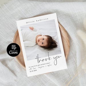 May include: A white thank you card with a photo of a baby girl in a white onesie. The text on the card reads "Olivia Anderson" and "thank you for your lovely gift and kind wishes! with love - baryanen & sophia 22-01-2024".