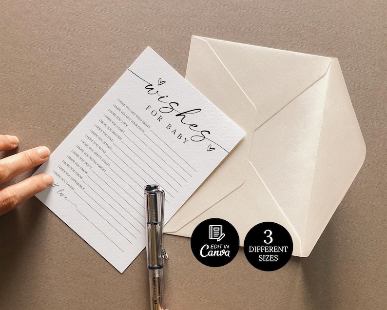 K&ouml;nnte beinhalten: Eine Babyparty-Wunschkarte mit den Worten "wishes for baby" in eleganter Schrift. Die Karte wird von einem cremefarbenen Umschlag und einem silbernen Stift begleitet. Das Bild enth&auml;lt auch zwei schwarze Kreise mit dem Text "Edit in Canva" und "3 Different Sizes".