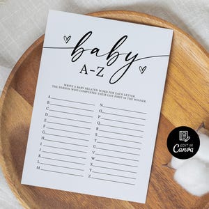 May include: A printable baby shower game with the title "baby A-Z". The game instructs players to write a baby-related word for each letter of the alphabet. The person who completes their list first is the winner.