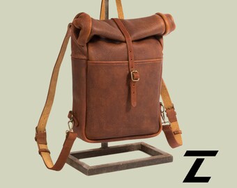 Vintage rundleer rugzak op rol, laptoptas voor reizen
