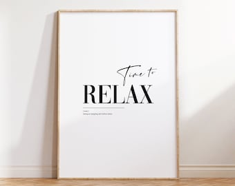 May include: A framed print with a white background and black text that reads "Time to Relax" with a definition below. The print is in a light wood frame.
