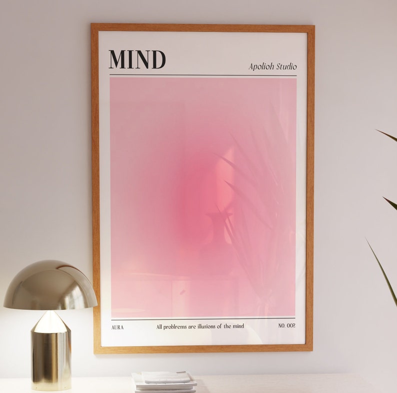 May include: A framed art print with a gradient pink and white background. The word "MIND" is at the top, with "Apolioh Studio" to the right. The text "All problems are illusions of the mind" is at the bottom, with "AURA" and "NO. 002" on either side.
