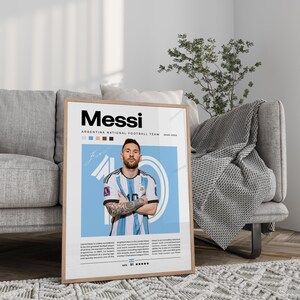 May include: A poster featuring a photo of Lionel Messi in his Argentina national football team jersey. The poster has a blue background with the text "Messi" in black and "Argentina National Football Team 2005-2023" in white. The poster also includes a rating of 91 stars and a quote about Messi's skills.