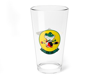 May include: A clear glass pint glass with a green frog cartoon mascot wearing a pilot's helmet and holding a thumbs up. The frog is sitting on a red and white airplane. The mascot is surrounded by a yellow circle with a green border and wings. The text "VT-19" is printed below the circle.