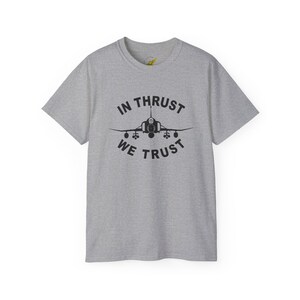 May include: A heather grey t-shirt with a black graphic of a jet plane and the text "In Thrust We Trust".