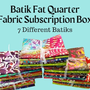 May include: A stack of colorful batik fabric fat quarters, tied with a white ribbon. The fabric is arranged in a variety of patterns and colors, including red, orange, yellow, green, blue, purple, and pink. The text "Batik Fat Quarter Fabric Subscription Box" and "7 Different Batiks" is visible at the top of the image.