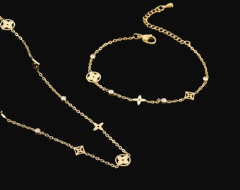 Louis Vuitton Bracelet fleur de trèfle doré signé numéroté -  France